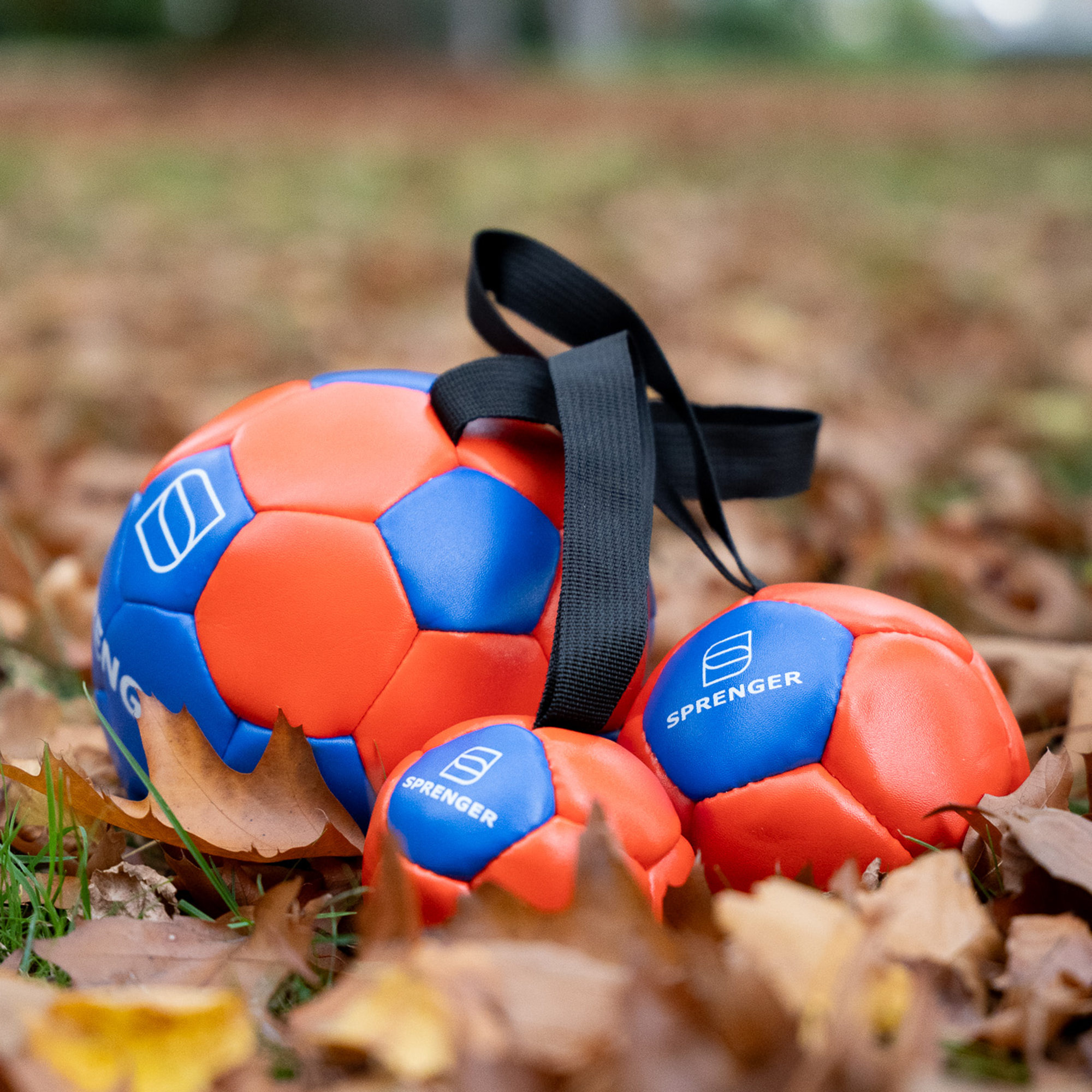 Vegan Leather Ball with Hand Strap